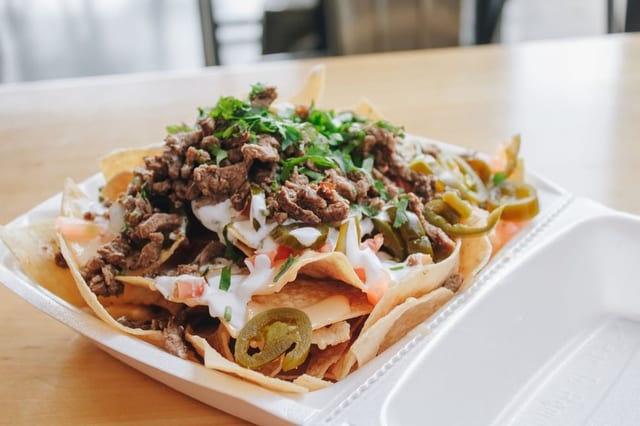 Nachos queso + meat.